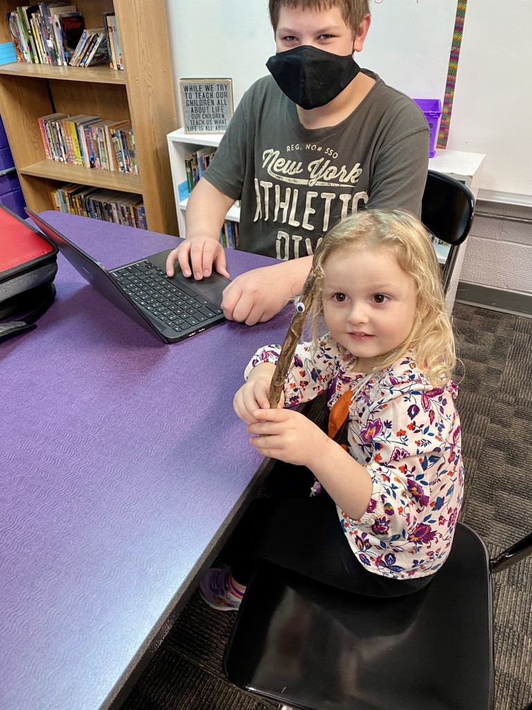 A preschooler reads about Sticky the Stick