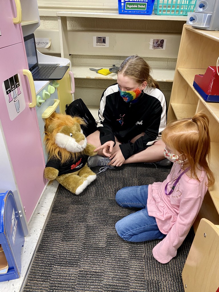 Leah reading to her preschooler